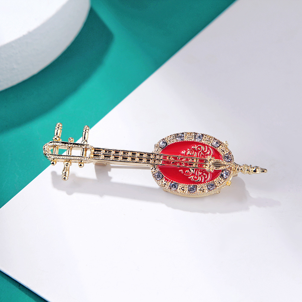 Antique Lute Red Enamel Brooch - огляд і ціна Suit Supply Wedding Party